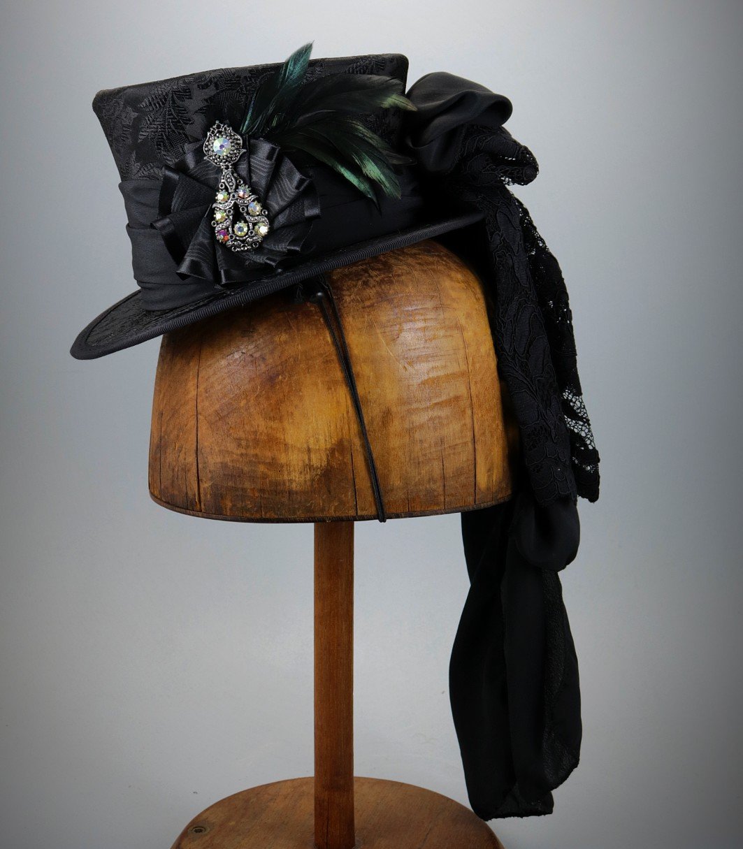 Black Mini Top Hat with Antique Brooch and Ribbon Cockade